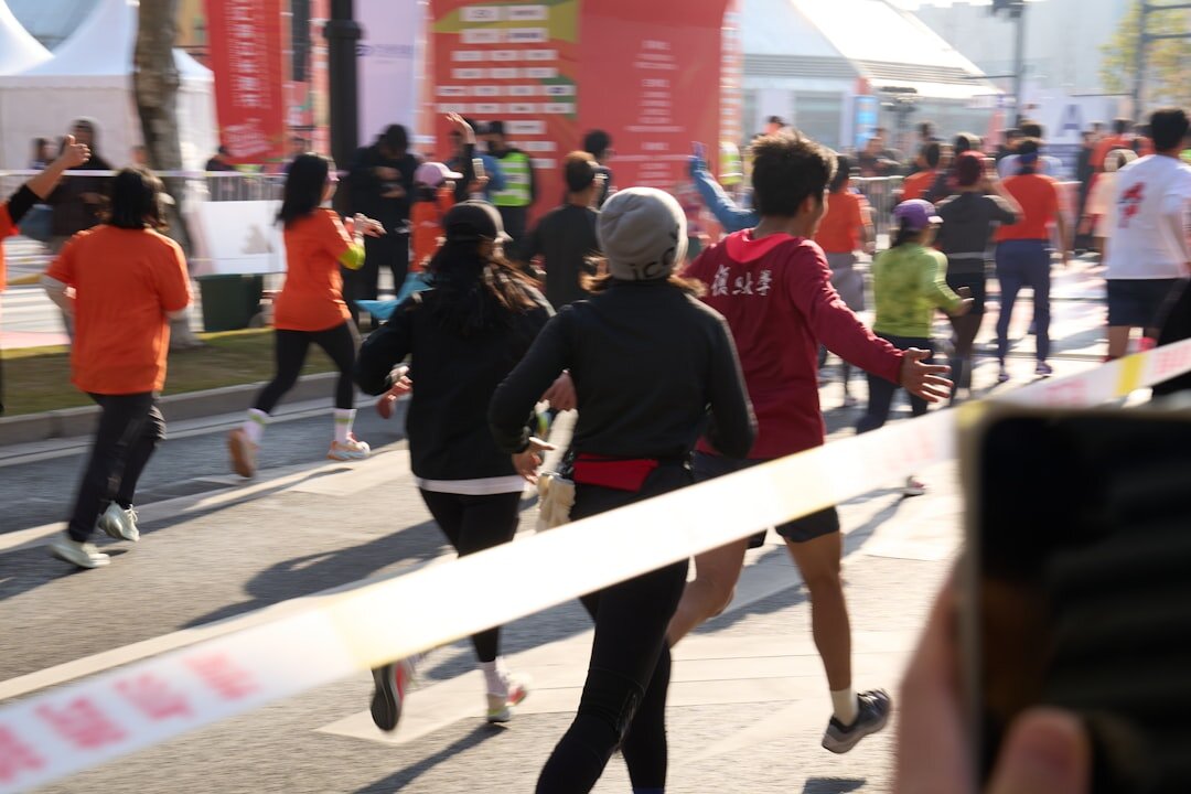 young athlete crossing finish line