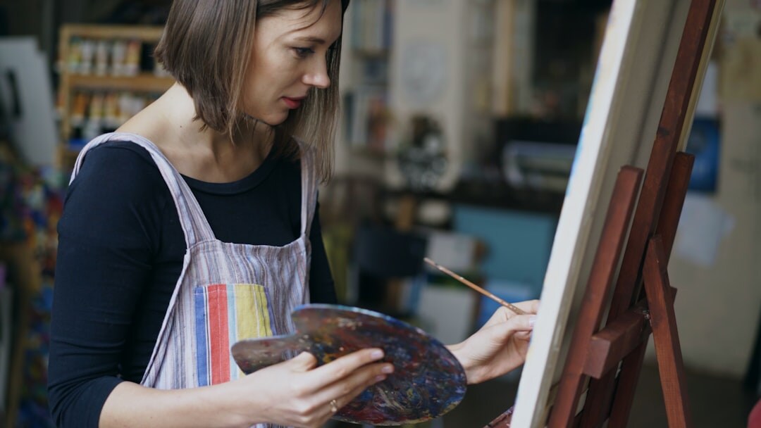 artist painting in studio