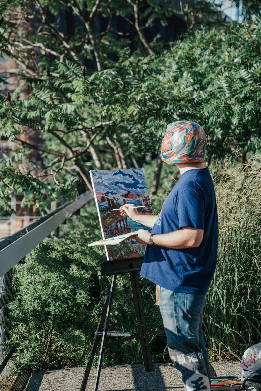 artist working on canvas
