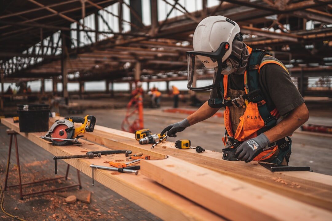 man working with wood